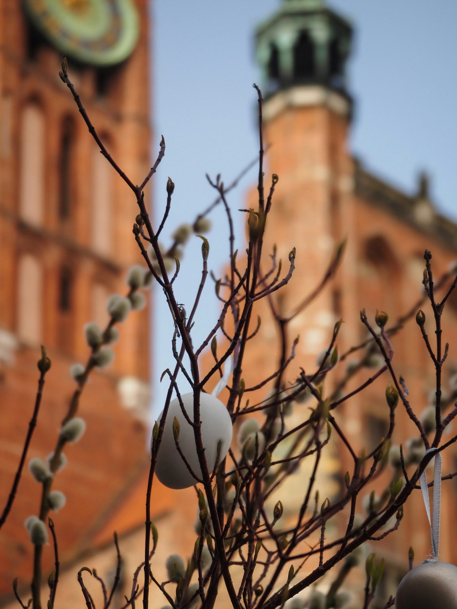 a building with a clock tower in the background